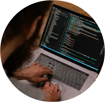 Working on a laptop — SaaS paid media at Snowball Creations