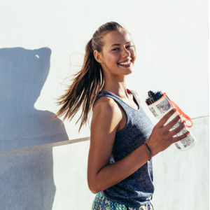 Woman Drinking Water Representing Health